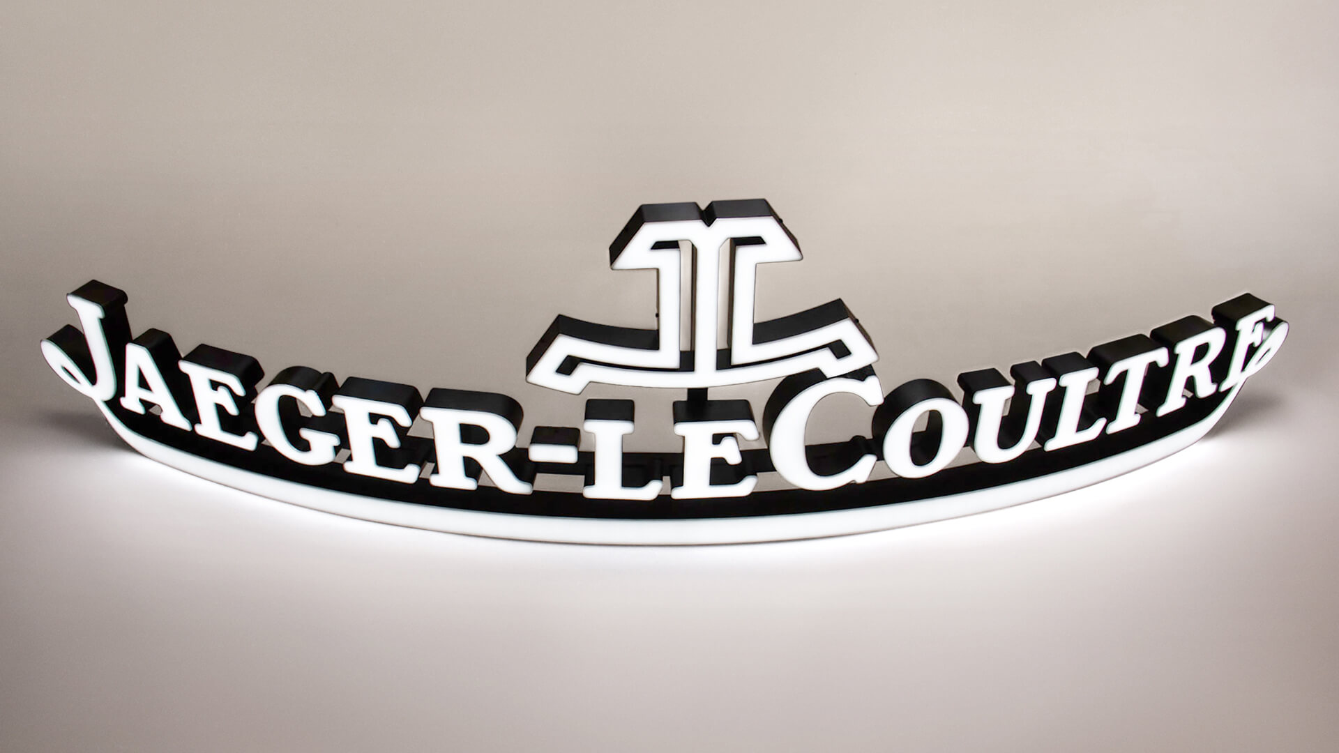 Jaeger-LeCoultre - logo świecące przodem w białym kolorze